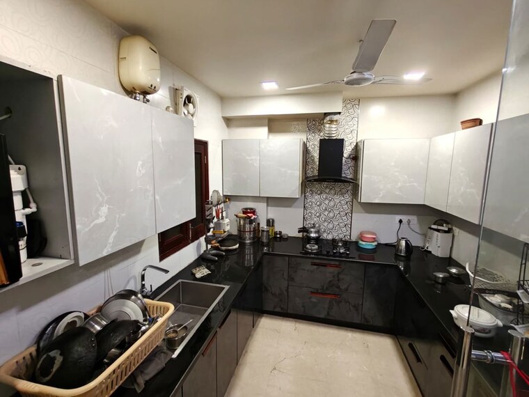 Kitchen, rajouri garden 3 Bedroom 190 Sq.Yd. Builder Floor In Rajouri Garden Delhi 10103531