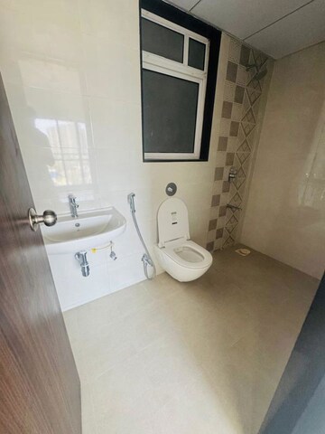 Bathroom in 3 BHK Apartment at Jhamtani Ace Abode, Kiwale – for Sale