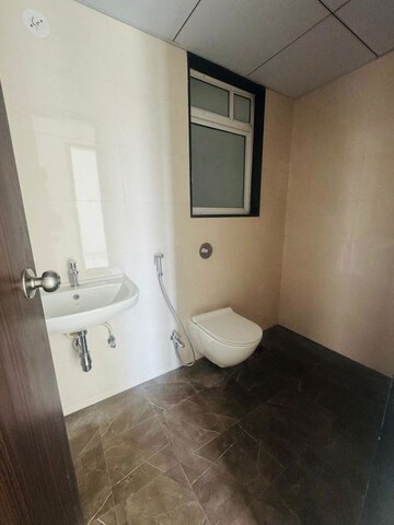 Bathroom in 3 BHK Apartment at Jhamtani Ace Abode, Kiwale – for Sale