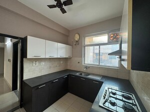 Kitchen in 3 BHK Builder Floor at Ansal API Esencia, Sector 67 – for Rent