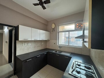 Kitchen in 3 BHK Builder Floor at Ansal API Esencia, Sector 67 – for Rent