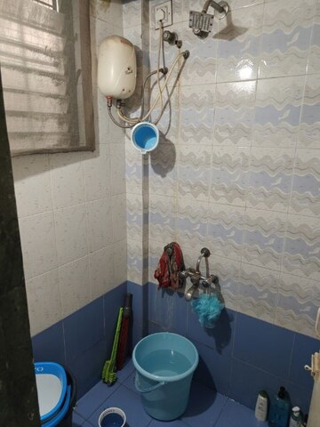 Bathroom in 1 BHK Apartment at Fam CHS, Kopar Khairane – for Rent