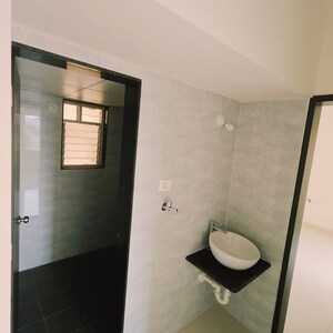 Bathroom in 2 BHK Apartment at Paranjape Schemes Madhukosh, Sinhagad Road – for Sale