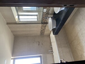 Bathroom in 3 BHK Apartment at Adani Tatva Estates, Sector 99a – for Rent