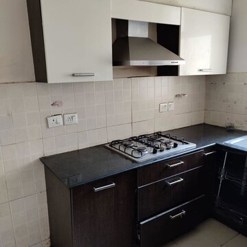Kitchen in 3 BHK Builder Floor at Ansal API Esencia, Sector 67 – for Rent