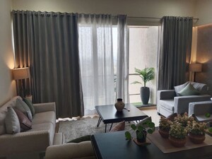 Living Room in 3 BHK Apartment at Lodha Belmondo, Gahunje – for Sale