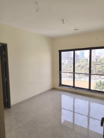 Room in 2 BHK Apartment at IM Applaud 38, Goregaon East – for Rent