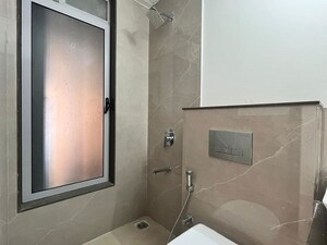 Bathroom in 1 BHK Apartment at Piramal Revanta, Mulund West – for Rent