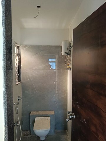 Bathroom in 2 BHK Apartment at DGS Sheetal Anupam, Malad West – for Rent