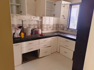 Kitchen in 2 BHK Apartment at Riverdale Tower, Andheri East – for Rent