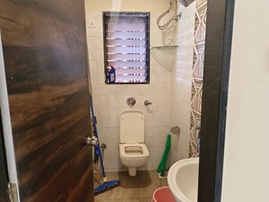 Bathroom in 2 BHK Apartment at Riverdale Tower, Andheri East – for Rent