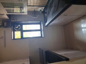 Kitchen in 1.5 BHK Apartment at Pulkit CHS, Andheri West – for Rent