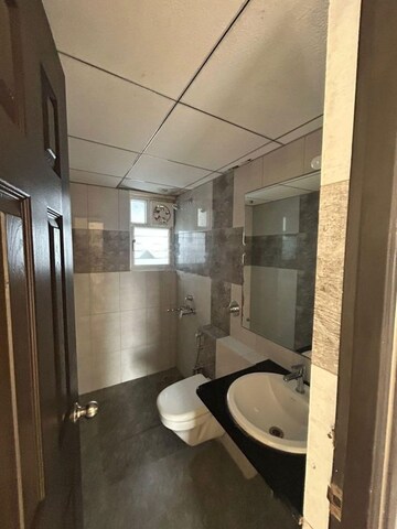 Bathroom in 4 BHK Apartment at NVT Life Square, Whitefield – for Rent