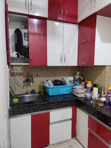 Kitchen in 2 BHK Apartment at Exotica Dreamville, Sector 16c Greater Noida – for Rent