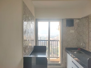 Kitchen in 1 BHK Apartment at Raunak Residency Thane, Pokhran Road No One – for Rent