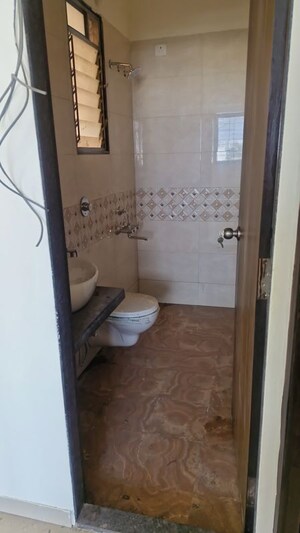 Bathroom in 1 BHK Apartment at Nagpal Sudarshan Paradise, Pimple Nilakh – for Rent