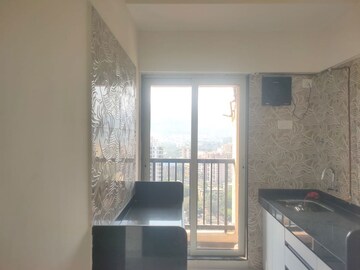 Kitchen in 1 BHK Apartment at Raunak Residency Thane, Pokhran Road No One – for Rent