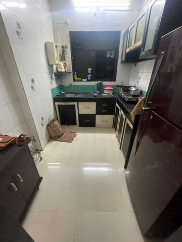 Kitchen in 2 BHK Apartment at Kulswamini Sai Balram Complex, Dombivli West – for Rent
