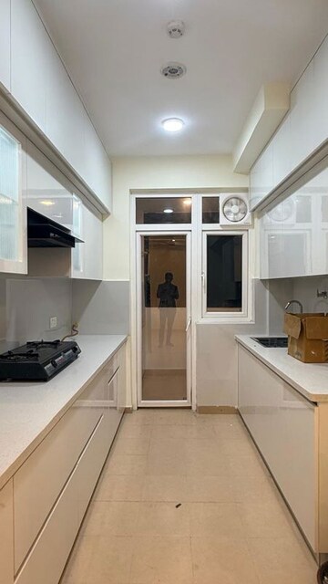 Kitchen in 3 BHK Apartment at Amrapali Heartbeat City, Sector 107 – for Rent