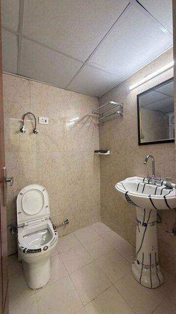 Bathroom in 3 BHK Apartment at Amrapali Heartbeat City, Sector 107 – for Rent