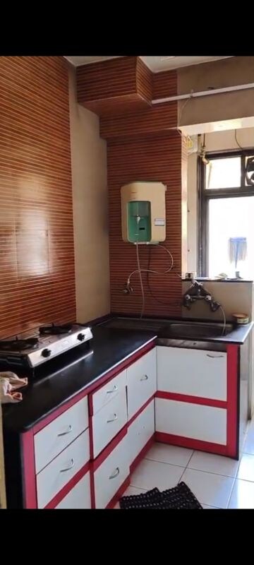 Kitchen in 2 BHK Apartment at Hiranandani Estate Carrara, Ghodbunder Road – for Rent