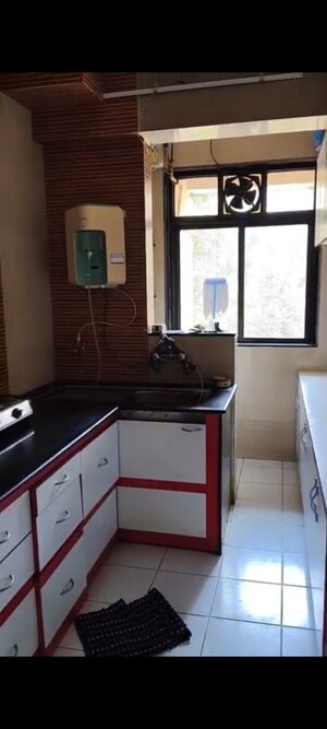 Kitchen in 2 BHK Apartment at Hiranandani Estate Carrara, Ghodbunder Road – for Rent