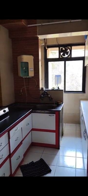 Kitchen in 2 BHK Apartment at Hiranandani Estate Carrara, Ghodbunder Road – for Rent