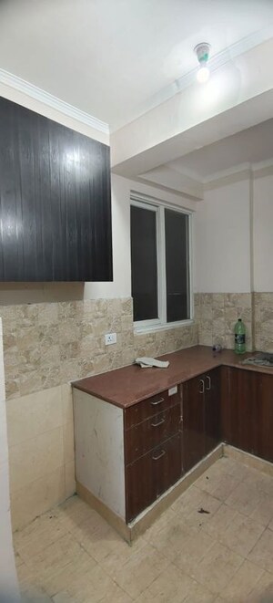 Kitchen in 3 BHK Apartment at Amrapali Golf Homes, Sector 4 Greater Noida – for Rent