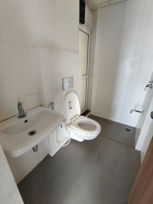 Bathroom in 1.5 BHK Apartment at Godrej Emerald, Ghodbunder Road – for Rent
