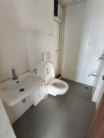 Bathroom in 1.5 BHK Apartment at Godrej Emerald, Ghodbunder Road – for Rent