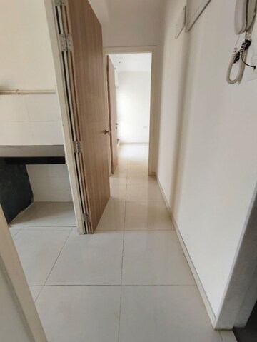 Building Lobby in 1.5 BHK Apartment at Godrej Emerald, Ghodbunder Road – for Rent