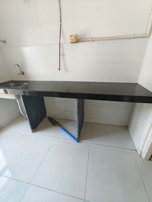 Kitchen in 1.5 BHK Apartment at Godrej Emerald, Ghodbunder Road – for Rent