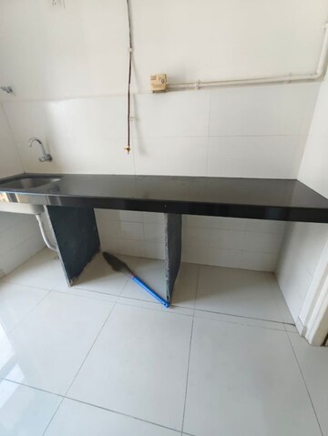 Kitchen in 1.5 BHK Apartment at Godrej Emerald, Ghodbunder Road – for Rent