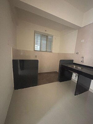 Kitchen in 1 BHK Apartment at Pharande Kairosa, Punawale – for Sale