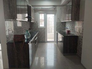 Kitchen in 4 BHK Apartment at Gaur Saundaryam, Tech Zone 4 Greater Noida – for Sale