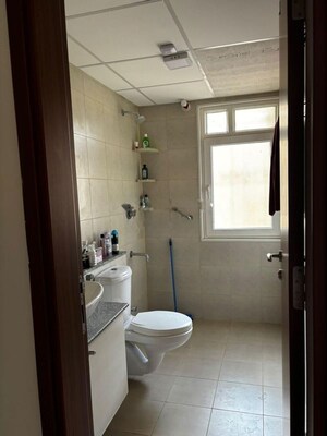 Bathroom in 3 BHK Apartment at Bhartiya Nikoo Homes, Thanisandra Main Road – for Rent