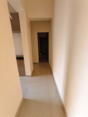 Building Lobby in 1 BHK Apartment at Ram Pushpanjali Residency, Owale – for Rent