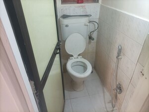 Bathroom in 1 BHK Apartment at Brahmand CHS, Brahmand – for Rent