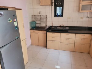 Kitchen in 2 BHK Apartment at Rohan Garima Phase II, Model Colony – for Rent