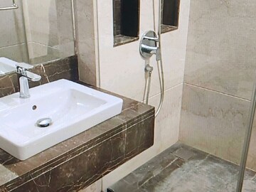 Bathroom in 3 BHK Apartment at K Raheja Modern Vivarea, Mahalaxmi – for Rent