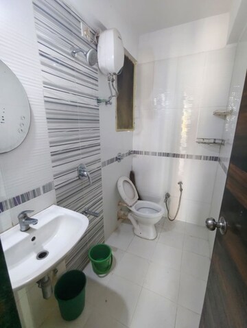 Bathroom in 2 BHK Apartment at Mahavir Kalpavruksha, Ghodbunder Road – for Rent