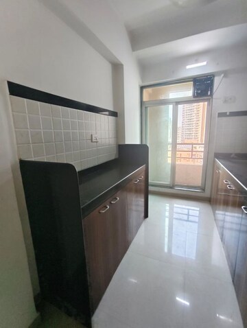 Kitchen in 2 BHK Apartment at Mahavir Kalpavruksha, Ghodbunder Road – for Rent