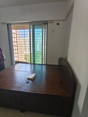Bedroom in 2 BHK Apartment at Mahavir Kalpavruksha, Ghodbunder Road – for Rent