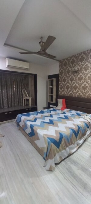 Bedroom in 2 BHK Apartment at Sankalpit CHS, Goregaon East – for Rent