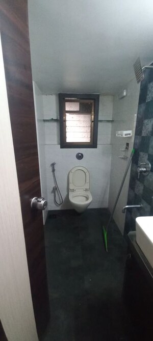 Bathroom in 2 BHK Apartment at Sankalpit CHS, Goregaon East – for Rent
