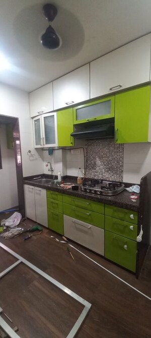 Kitchen in 2 BHK Apartment at Sankalpit CHS, Goregaon East – for Rent