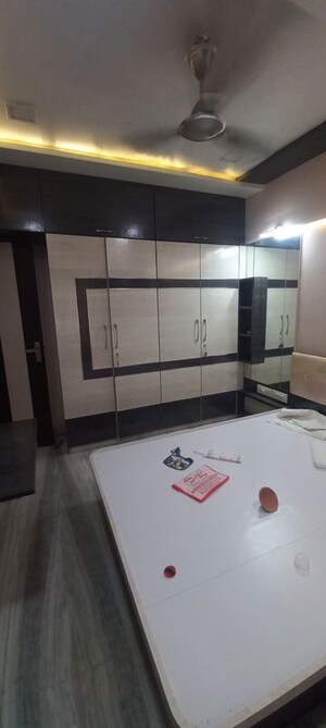 Kitchen in 2 BHK Apartment at Sankalpit CHS, Goregaon East – for Rent