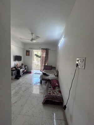 Living Room in 1 BHK Apartment at Tirupati Regalia, Vishrantwadi – for Rent
