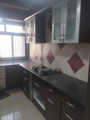 Kitchen in 2 BHK Apartment at Gala Pride Park, Manpada – for Rent