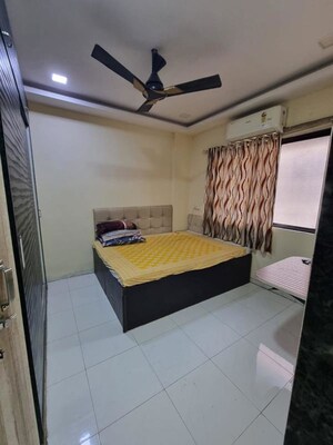 Bedroom in 2 BHK Apartment at Yashraj Park CHS, Kasarvadavali – for Rent
